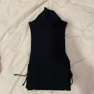 Black edikted knitted turtleneck cropped tank.